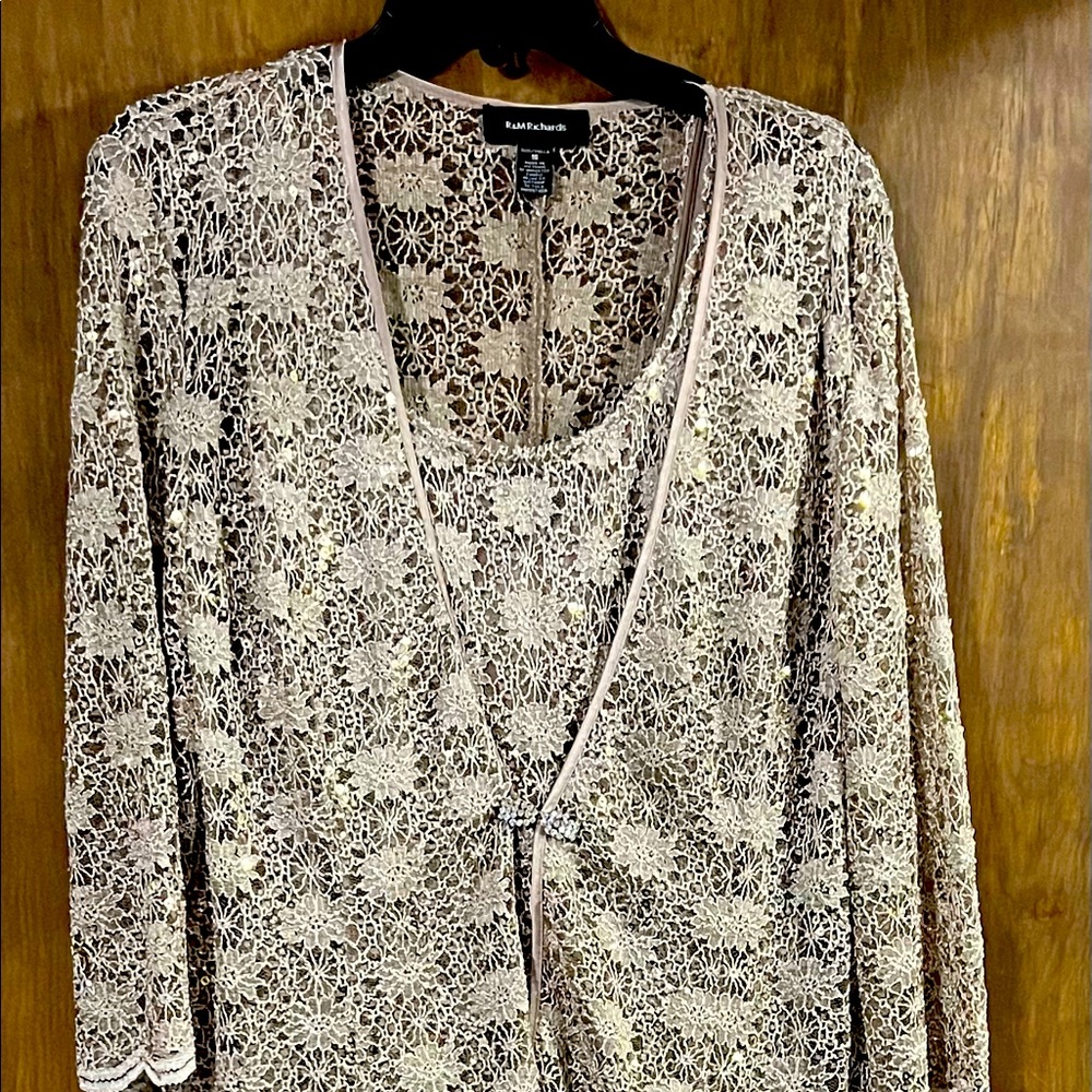Lovely lace and silk lined dress perfect for a formal event.